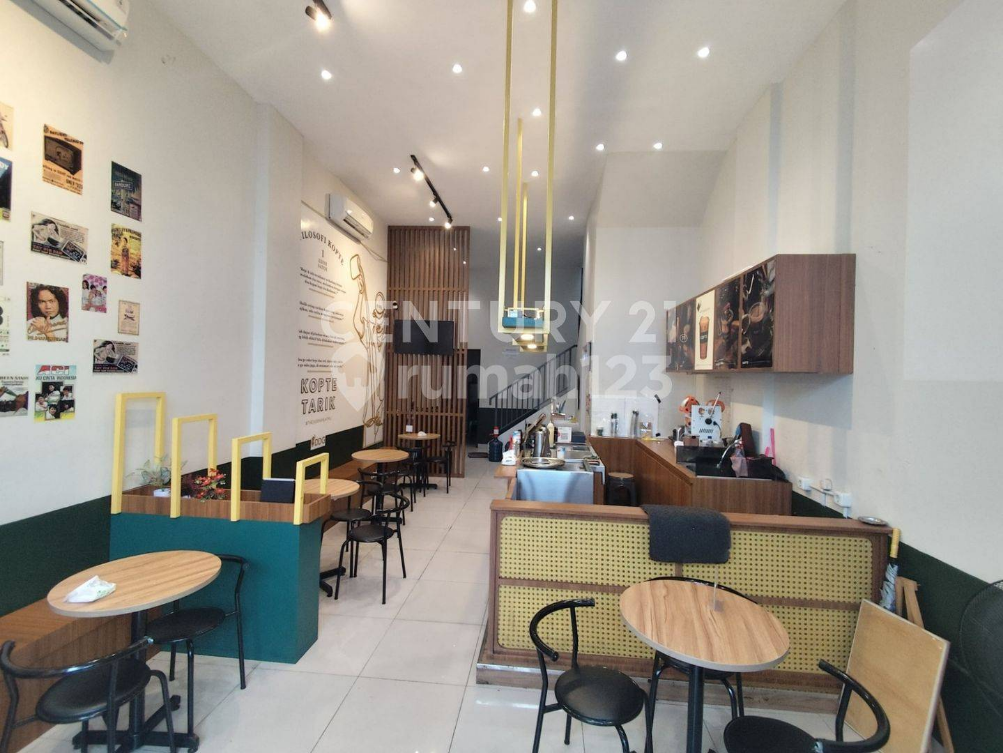 Modern Two-Story Commercial Space with Full Kitchen Setup