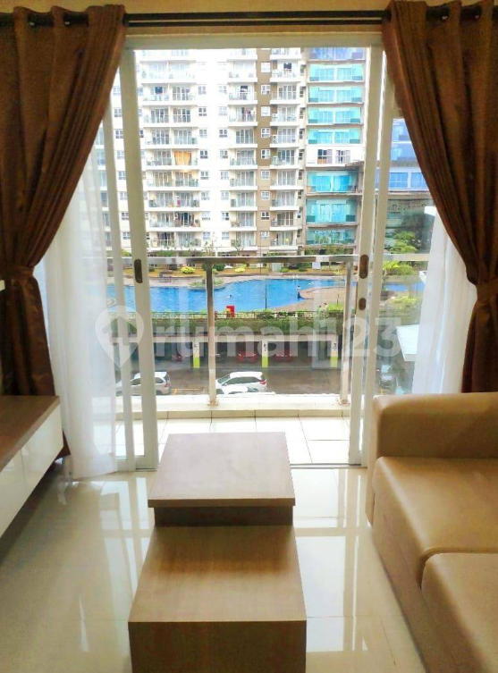 Furnished 2-Bedroom Apartment with Pool View