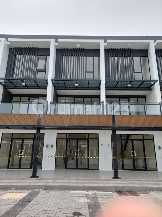 Modern 3-Story Commercial Space with Solar Panels