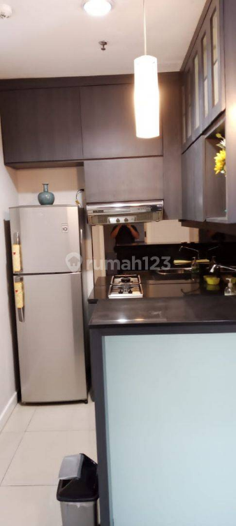 Furnished 2-Bedroom CBD Pluit Apartment with Pool View