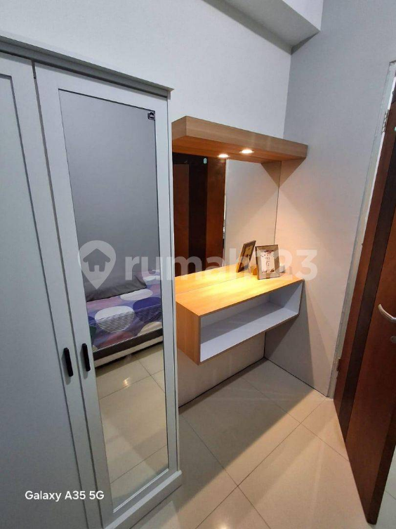 Furnished 2-Bedroom Apartment with City View