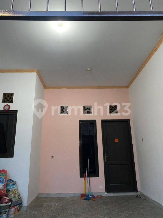 Four-Story Jelambar House with Two Bedrooms