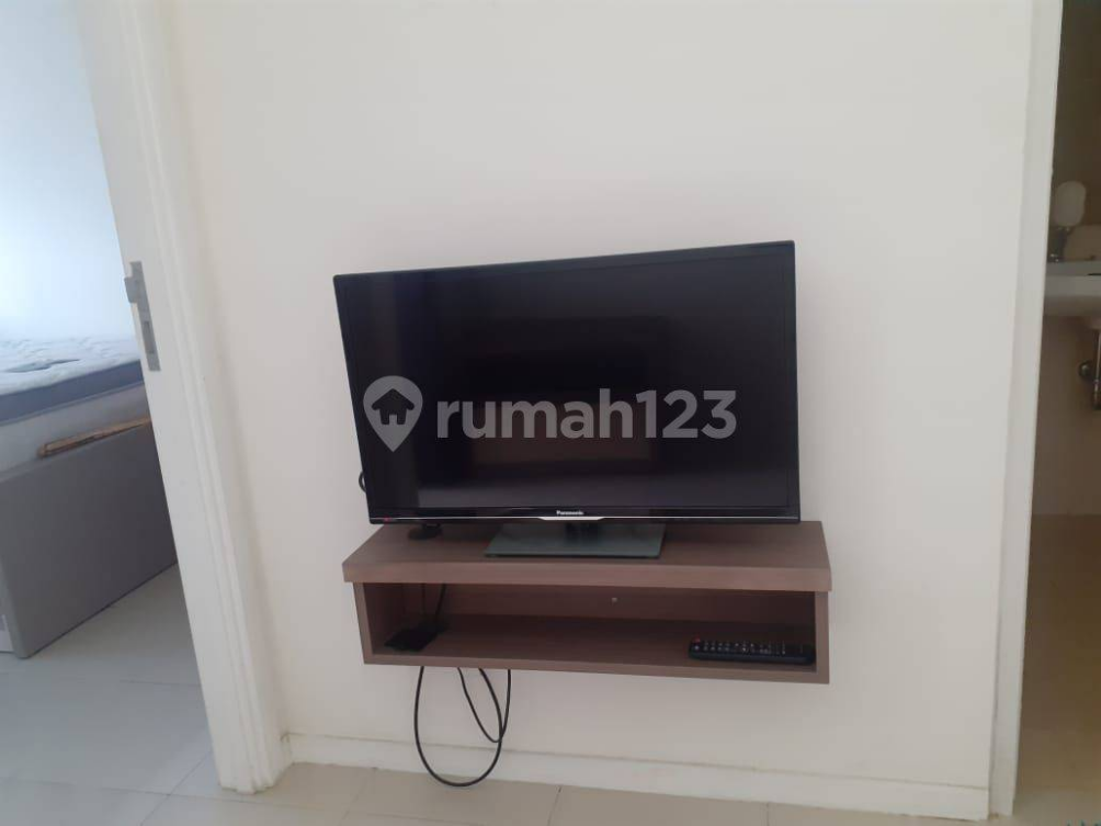 Furnished 1-Bedroom Apartment with City View
