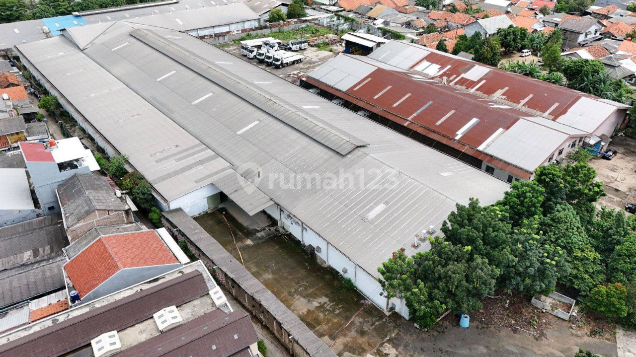 Large Industrial Warehouse Complex Near Toll Road