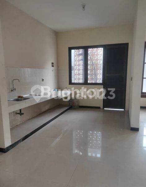 Renovated Two-Story House in Jemursari Regency