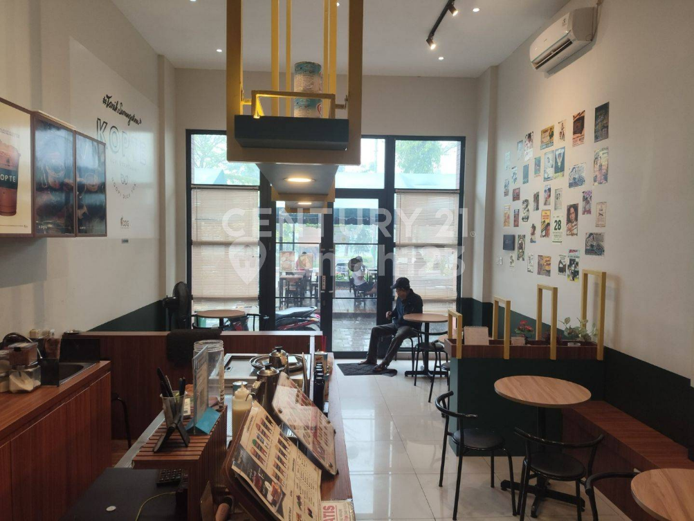 Modern Two-Story Commercial Space with Full Kitchen Setup