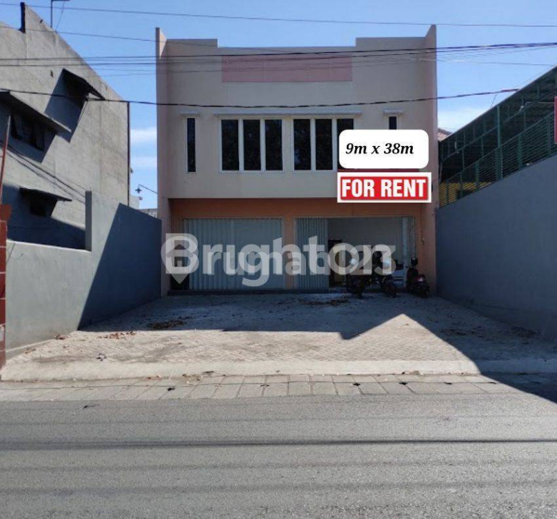Spacious Commercial Building with Large Parking Area