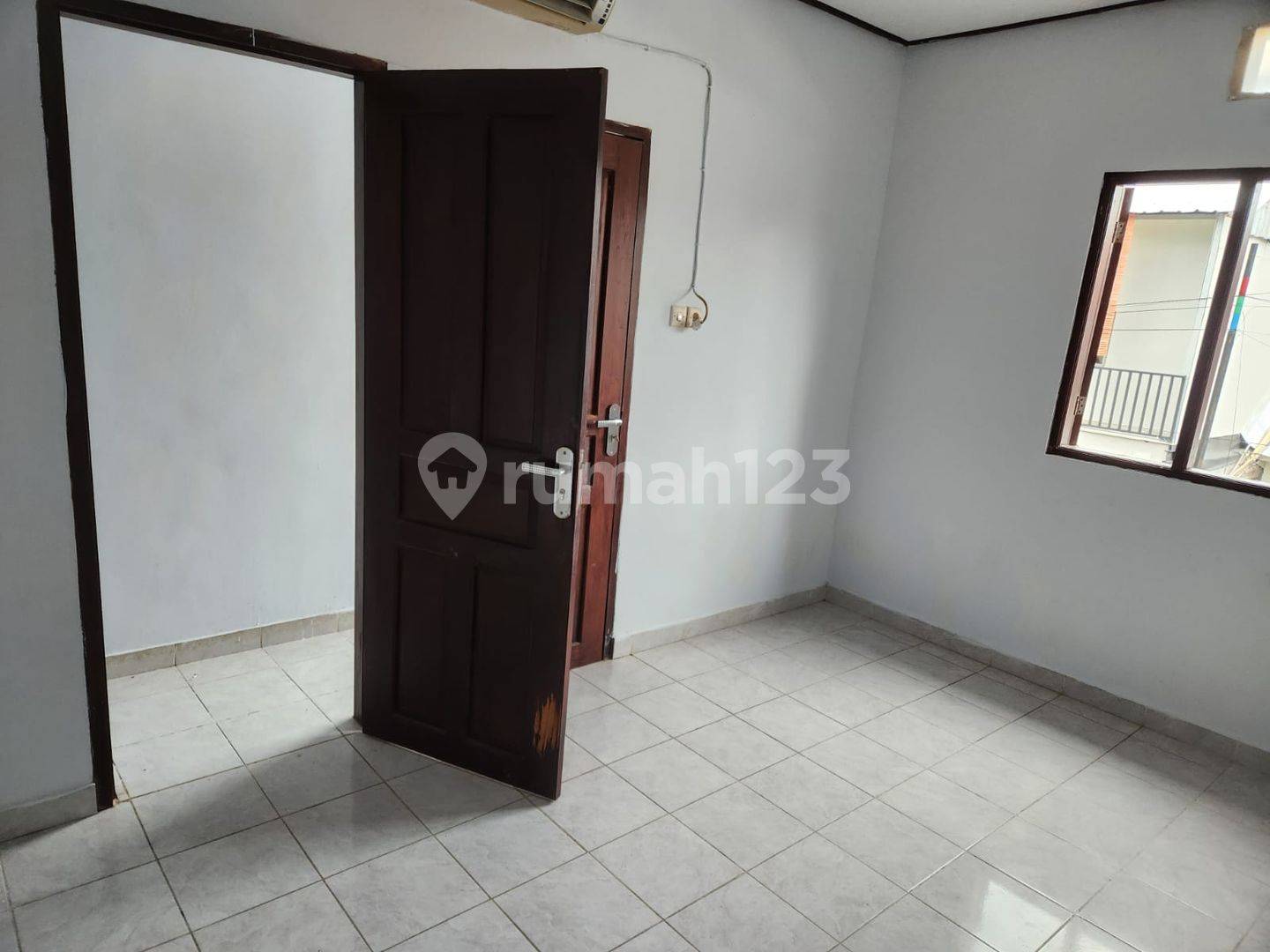 2-Story House with Small Store in Mahendradata, Denpasar - Strategically Located