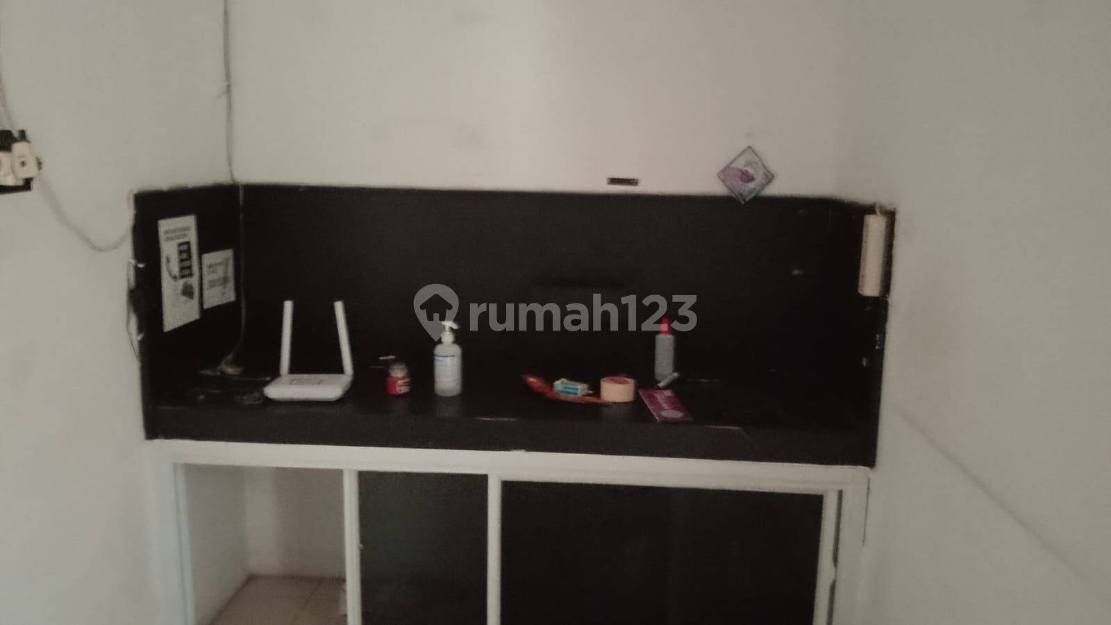 Бақшасы және балконы бар көп деңгейлі жылжымайтын мүлік