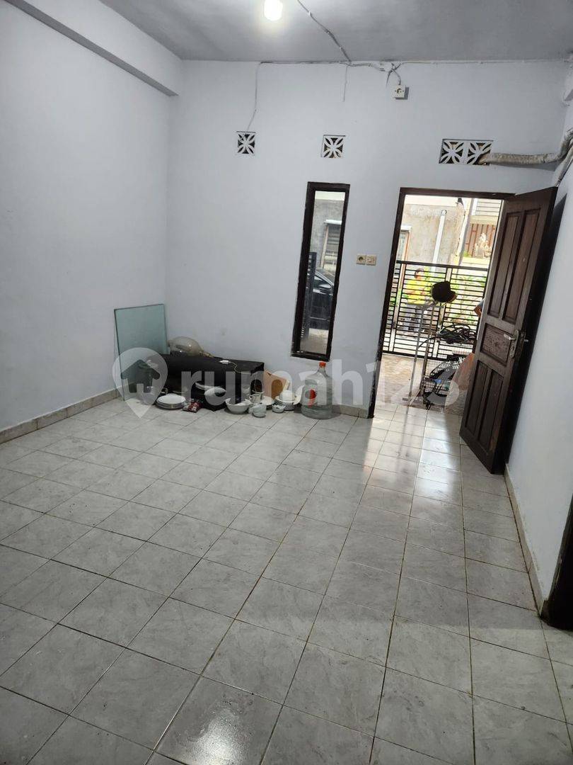 2-Story House with Small Store in Mahendradata, Denpasar - Strategically Located