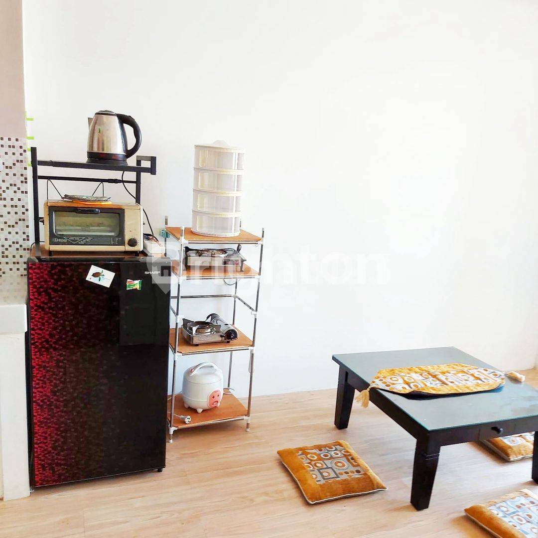 2BR Apartment at Puncak Dharmahusada - Comfortable Living Space
