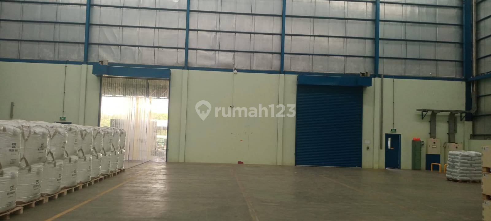 Modern Industrial Warehouse with Loading Dock and CCTV