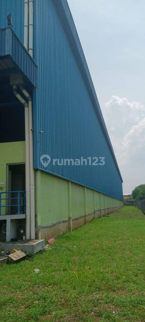 Modern Industrial Warehouse with Loading Dock and CCTV