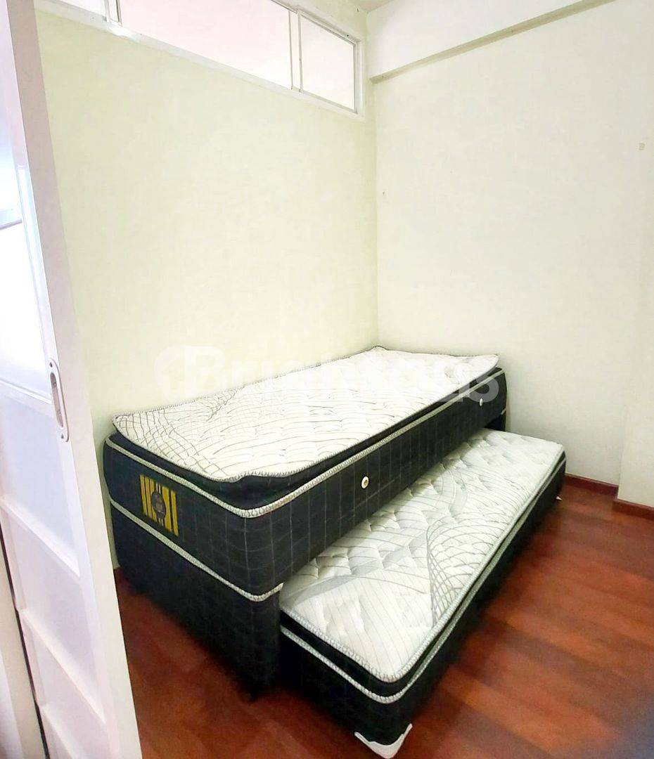 2BR Apartment at Puncak Dharmahusada - Comfortable Living Space